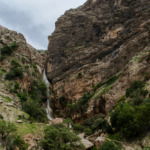 آبشار نوژیان لرستان و جوش‌وخروش آب میان جنگل