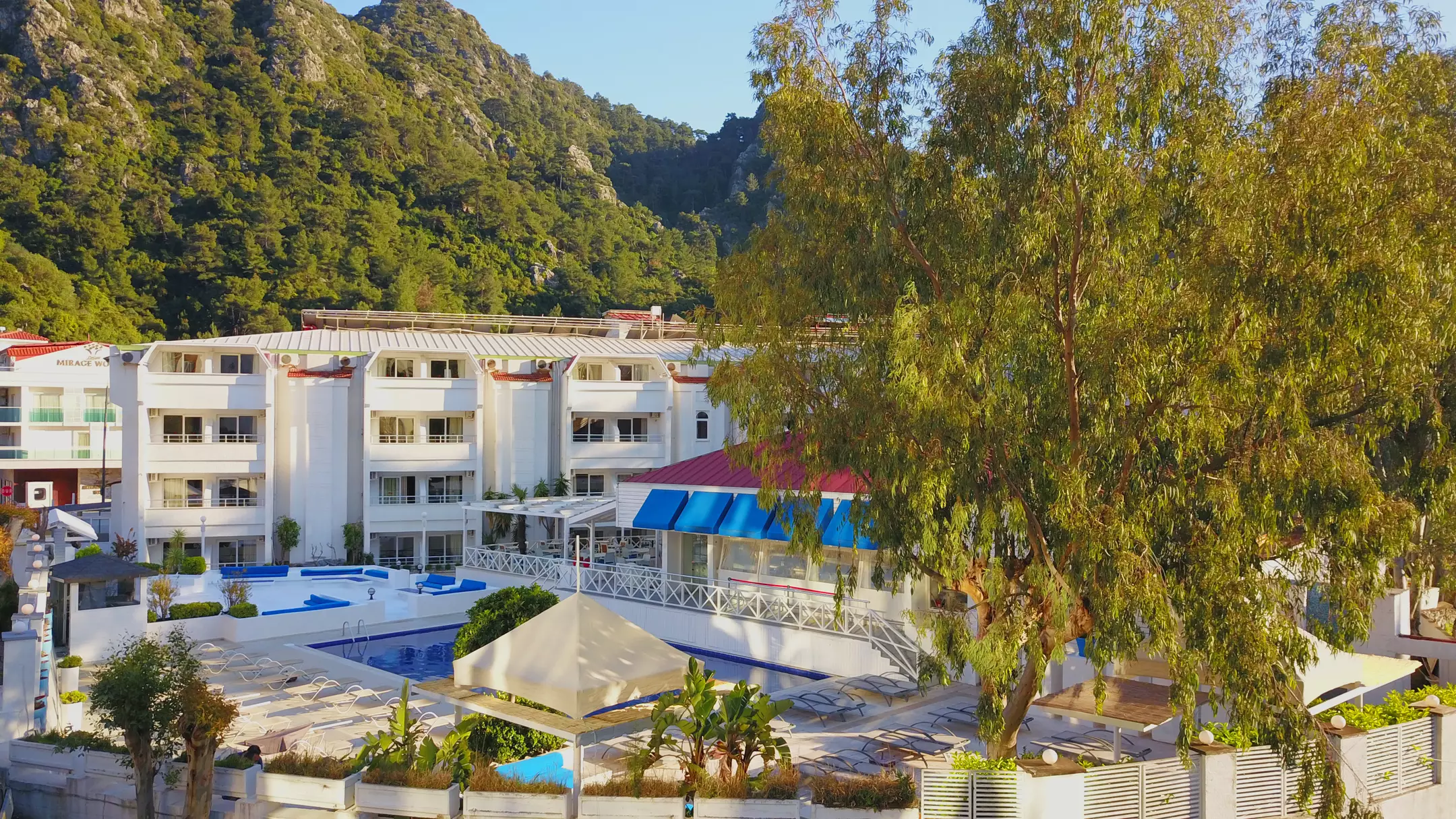 Alibaba https://cdn.alibaba.ir/ostorage/hotel-accommodation-images/69e820ef61ec039ef756842f_Icmeler-Club-Munamar-Beach-Resort-1.webp