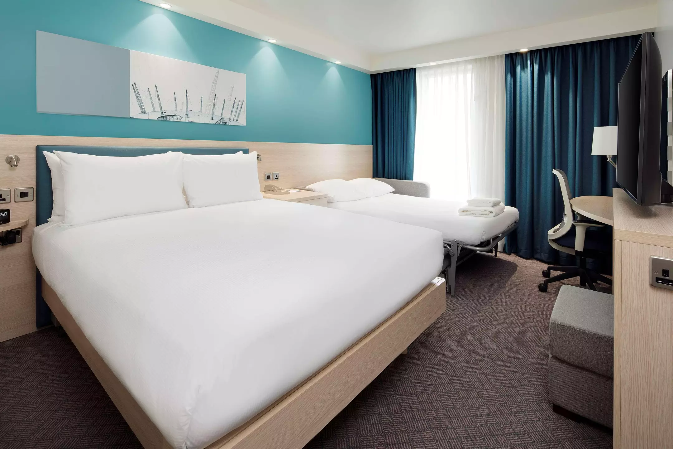 Alibaba https://cdn.alibaba.ir/ostorage/hotel-accommodation-images/69f2d908eb1ae654aaa50b77_London-Hampton-by-Hilton-London-Docklands-1.webp