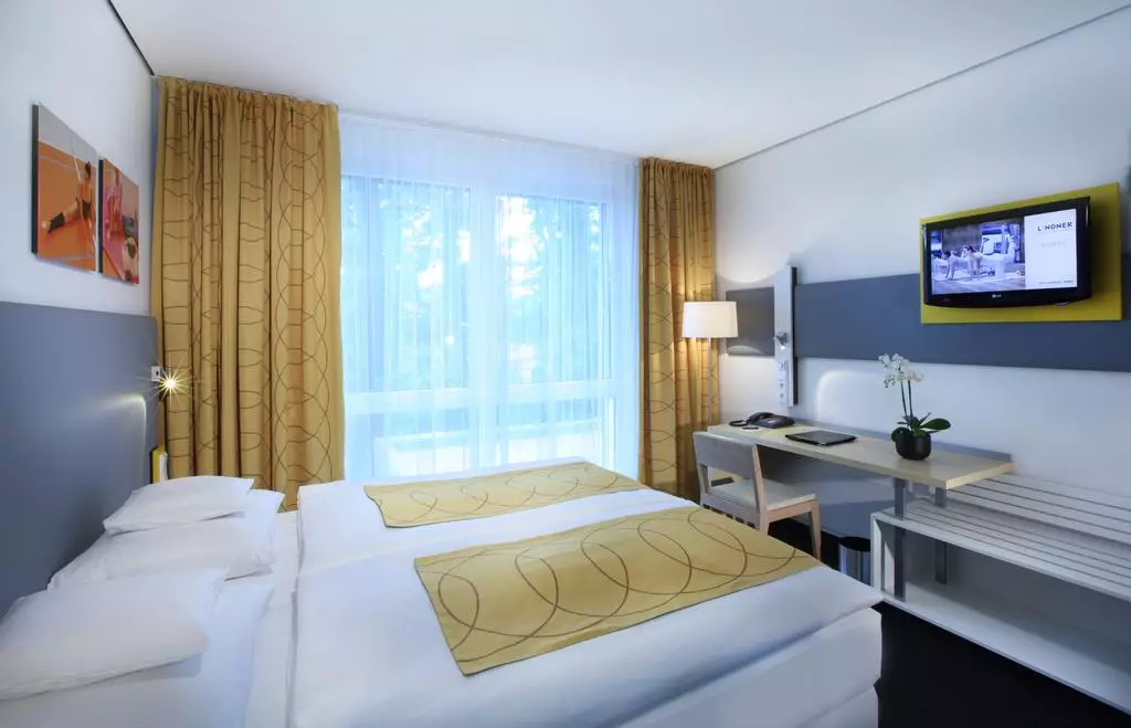 Alibaba https://cdn.alibaba.ir/ostorage/hotel-accommodation-images/69f7eb5561ec039ef75aceba_Frankfurt-am-Main-Lindner-Hotel--Sports-Academy-1.webp