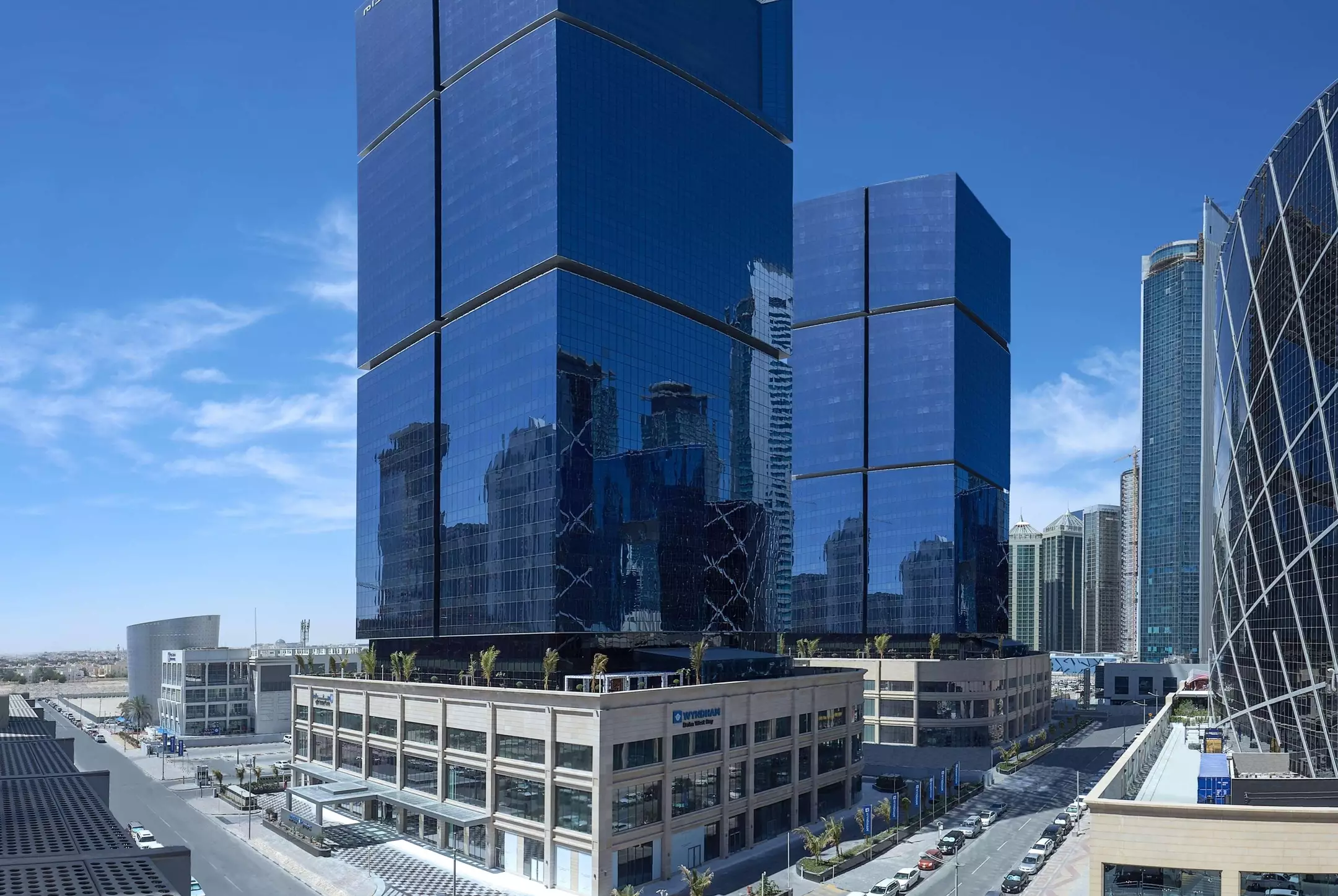 Alibaba https://cdn.alibaba.ir/ostorage/hotel-accommodation-images/6a3ce2d9eeea559349479a0c_Doha-Wyndham-Grand-West-Bay-0.webp